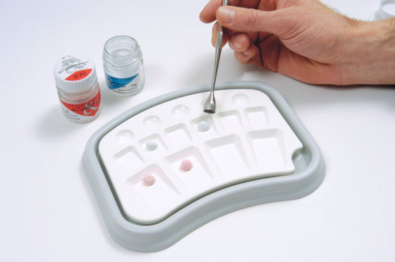 Metrical scoops Portioning instrument for porcelain