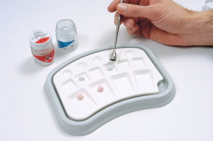 Metrical scoops Portioning instrument for porcelain